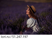 Lavender Woman Summer: Lady in lavender field enjoys sun with bouquet during summer. Стоковое фото, фотограф svetograph / Фотобанк Лори