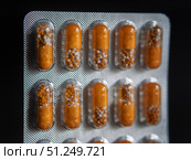 Close-Up of Orange and Yellow Tablets in Blister Pack. Стоковое фото, фотограф Sergakoff / Фотобанк Лори