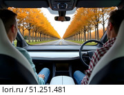 Hands on the wheel when driving at high speed from inside the car. Стоковое AI-изображение, AI-художник Ирина Старикова / Фотобанк Лори