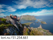 Amazing landscape of the Lofoten Islands from the top of Reinebringen Mountain with blue sky , county of Nordland, Norway (2016 год). Стоковое фото, фотограф Андрей Армягов / Фотобанк Лори