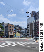 Nagasaki, Japan - May 12, 2025. Crossroad in Takaramachi District. Стоковое фото, фотограф Константин Никитеев / Фотобанк Лори