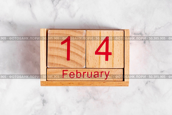 14 february wooden calendar. Стоковое фото, агентство Ingram Publishing / Фотобанк Лори