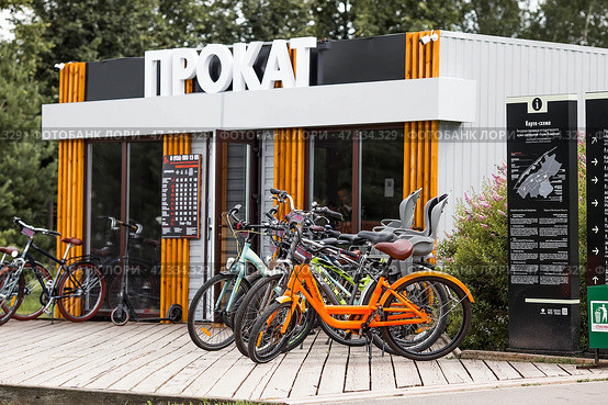 A bicycle or scooter rental point or point. Rent, hire, business. Russia, Moscow region, June 23, 2024. Редакционное фото, фотограф Photojuli / Фотобанк Лори