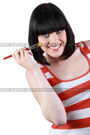 a brunette woman with a make-up pencil. Стоковое фото, агентство Ingram Publishing / Фотобанк Лори