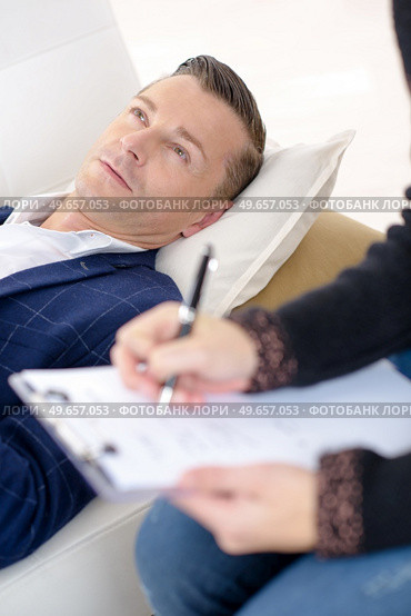 a depressed man being treated. Стоковое фото, агентство Ingram Publishing / Фотобанк Лори