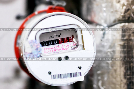 A detailed close up of a water meter that clearly shows  m3  on it. Стоковое фото, фотограф Аксенова Вера / Фотобанк Лори