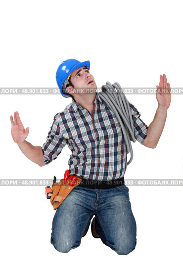 A fearful tradesman. Стоковое фото, агентство Ingram Publishing / Фотобанк Лори