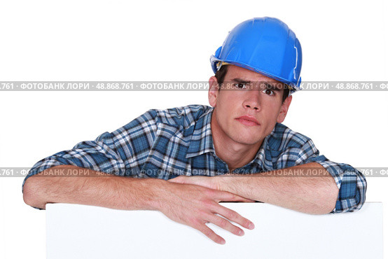 A glaring tradesman. Стоковое фото, агентство Ingram Publishing / Фотобанк Лори