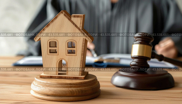 A judge sits at a table with a wooden house and gavel nearby, depicting a legal setting. Стоковое AI-изображение, AI-художник Юрий Поздников / Фотобанк Лори