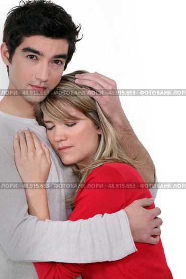 A man comforting his girlfriend. Стоковое фото, агентство Ingram Publishing / Фотобанк Лори