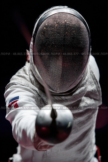 A man in a white uniform is fencing with a sword. Стоковое AI-изображение, AI-художник Ярославский Максим / Фотобанк Лори