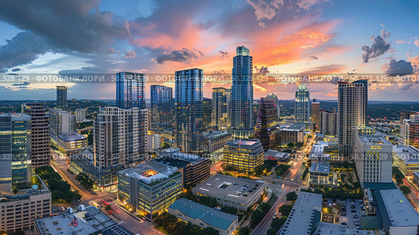 A panoramic view of a city bathed in the glow of the setting sun, captured from a birds eye perspective. Стоковое AI-изображение, AI-художник Данила Большаков / Фотобанк Лори