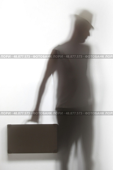 A shadow of a man holding a briefcase. Стоковое фото, агентство Ingram Publishing / Фотобанк Лори