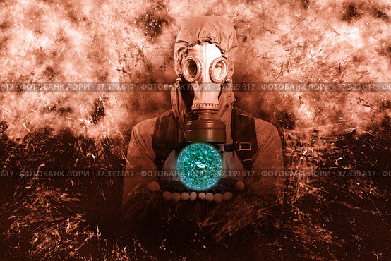 A shot of a man dressed in a gas mask, a jacket with a hood, a backpack, holding the palms of his hands parallel to the floor in front of him as if there was something in them. A poster on the background of grunge. Стоковое фото, фотограф Владимир Арсентьев / Фотобанк Лори