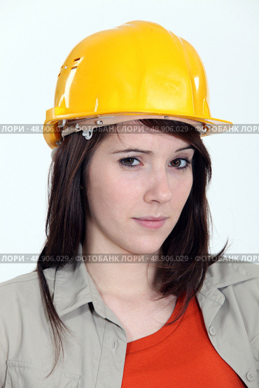 A suspicious construction worker. Стоковое фото, агентство Ingram Publishing / Фотобанк Лори