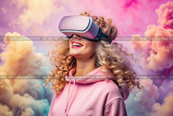 A young beautiful girl in a pink hoodie playing virtual reality in fabulous pink clouds with a virtual reality headset in front of her eyes. Стоковое AI-изображение, AI-художник Photojuli / Фотобанк Лори