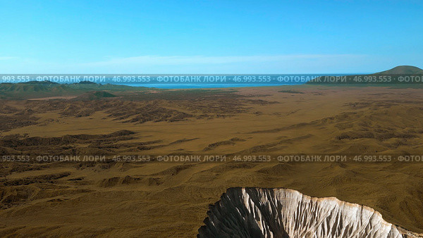 Aerial view of autumn yellow valley and stony cleft. Стоковое фото, фотограф David Kashakhi / Фотобанк Лори