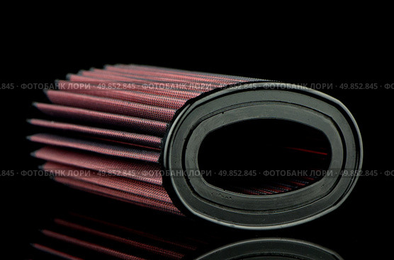 Air cone filter on black background. Vehicle Modification Accessories. Стоковое фото, агентство Ingram Publishing / Фотобанк Лори
