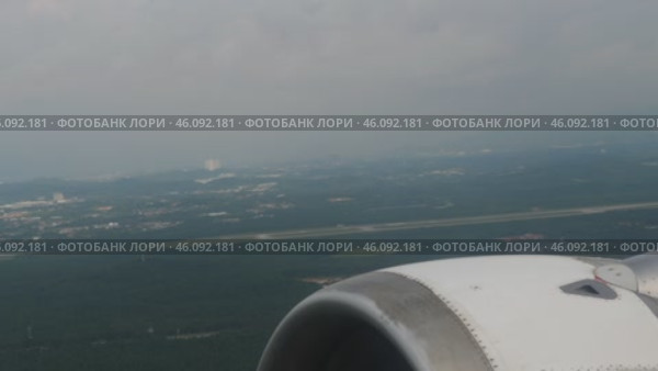 Airplane in flight, porthole. Стоковое видео, видеограф Игорь Жоров / Фотобанк Лори
