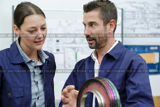 airplane service crew repairing something. Стоковое фото, агентство Ingram Publishing / Фотобанк Лори