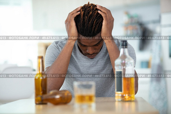 alcoholism alcohol addiction and people concept. Стоковое фото, агентство Ingram Publishing / Фотобанк Лори