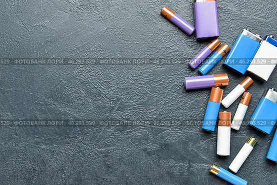 Alkaline batteries on black background. Стоковое фото, фотограф Pixel_shot / Фотобанк Лори