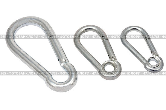 Альпинистские карабины на белом фоне. Climber carabiners on a white background. Стоковое фото, фотограф Татьяна Д / Фотобанк Лори