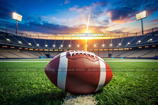 American football. A rugby ball in the stadium. The concept of sports games and competitions. The Summer Olympic Games. Стоковое AI-изображение, AI-художник Photojuli / Фотобанк Лори