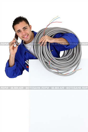 an artisan at phone. Стоковое фото, агентство Ingram Publishing / Фотобанк Лори