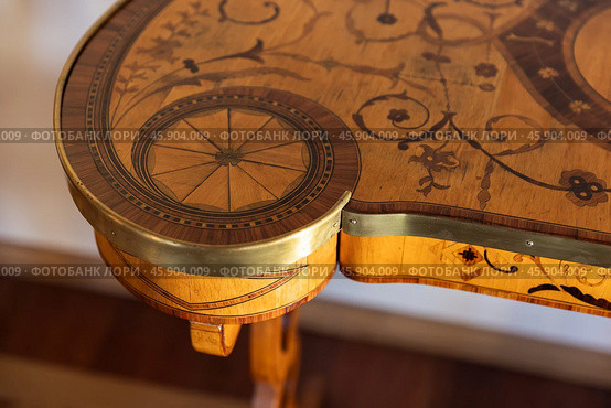 An empty antique table with wood inlay, close up photo. Стоковое фото, фотограф EugeneSergeev / Фотобанк Лори