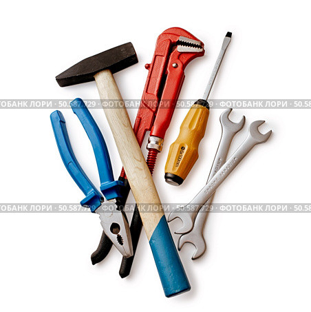 Assorted DIY tools with a red mole grip or adjustable spanner, pliers, screwdriver and pair of spanners, overhead view on white. Assorted DIY tools. Стоковое фото, агентство Ingram Publishing / Фотобанк Лори