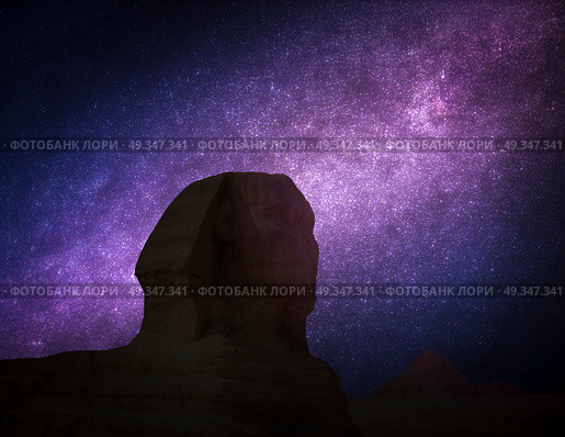 Astrophotography, night starry sky. pyramids in Giza. Complex of ancient buildings in Egypt. pyramids in Giza. . Стоковое фото, агентство Ingram Publishing / Фотобанк Лори