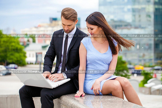 Attractive business young couple working together. Стоковое фото, фотограф Андрей Аркуша / Фотобанк Лори