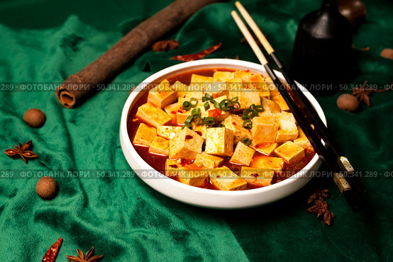 Authentic Ma Po Tofu Served in a White Bowl at a Chinese Restaurant. Стоковое фото, фотограф Aleksandr Golubev / Фотобанк Лори