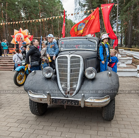 Автомобиль ГАЗ м1(Эмка) автомобиль сталинских репрессий и руководства СССР, на выставке ретро автотехники в городе Железногорске Красноярский Край. Редакционное фото, фотограф Анатолий Володин / Фотобанк Лори