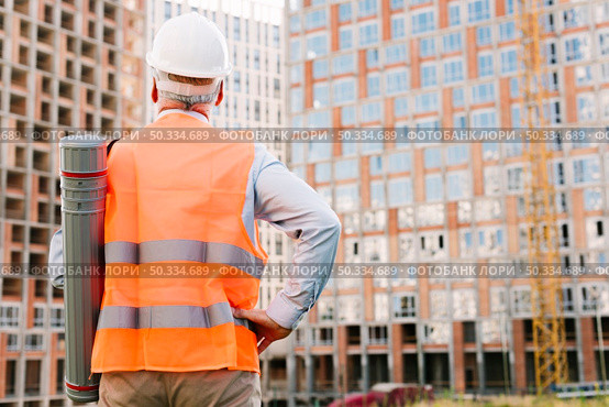 back view old man with hand hip. Стоковое фото, агентство Ingram Publishing / Фотобанк Лори