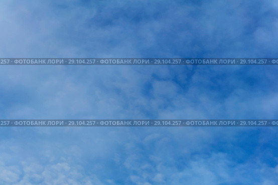 Background - blue day sky with white cirro-cumulus clouds. Стоковое фото, фотограф Евгений Харитонов / Фотобанк Лори