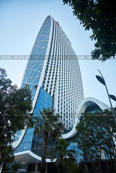 Batumi, Georgia. - July 04, 2023: the buildings of modern architecture in which the Marriott hotel is located in the center of Batumi. Редакционное фото, фотограф Наталия Кирсанова / Фотобанк Лори