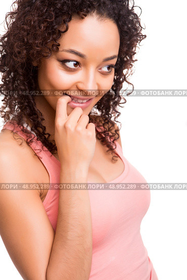 Beautiful african woman thinking over white background . Стоковое фото, агентство Ingram Publishing / Фотобанк Лори