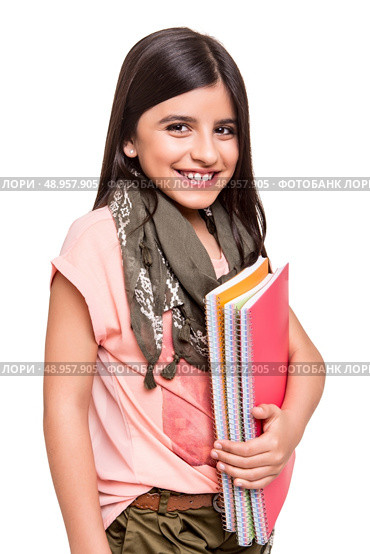 Beautiful little girl holding sketchbooks over white. Стоковое фото, агентство Ingram Publishing / Фотобанк Лори