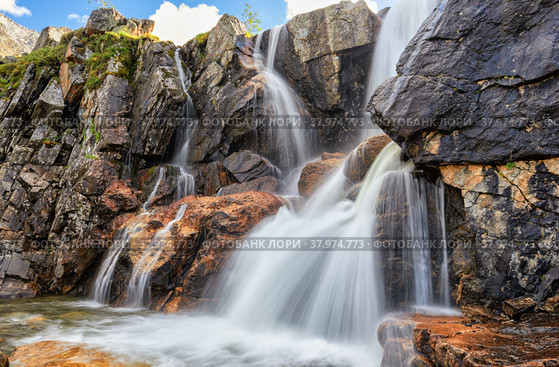 Beautiful waterfall in mountain tundra. Стоковое фото, фотограф Виктор Никитин / Фотобанк Лори