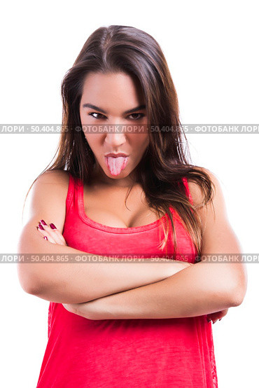 Beautiful young woman making  a grimace with her tongue off, isolated over a white background. Стоковое фото, агентство Ingram Publishing / Фотобанк Лори