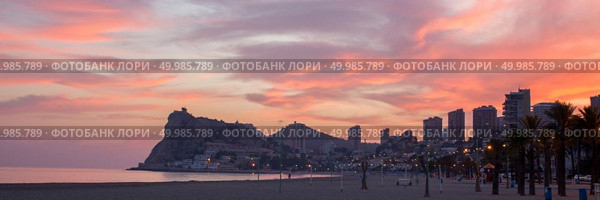 Benidorm. Panoramic, landscape sunset on the coast from Calpe to Alicante in the Mediterranean Spain. Benidorm sunset view from Calpe Alicante. Стоковое фото, агентство Ingram Publishing / Фотобанк Лори