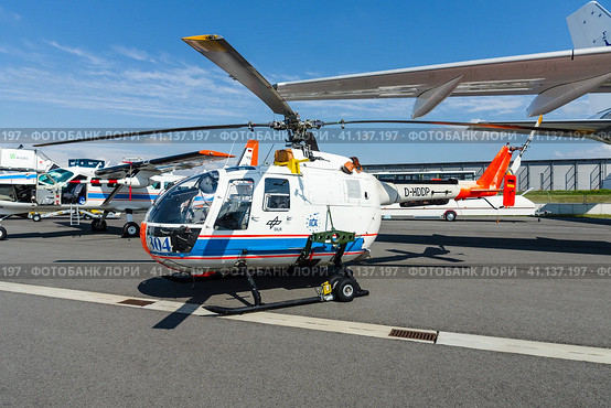 BERLIN, GERMANY - JUNE 02, 2016: Research helicopter Eurocopter MBB Bo105 by German Aerospace Center (DLR). Exhibition ILA Berlin Air Show 2016. Редакционное фото, фотограф Sergey Kohl / Фотобанк Лори