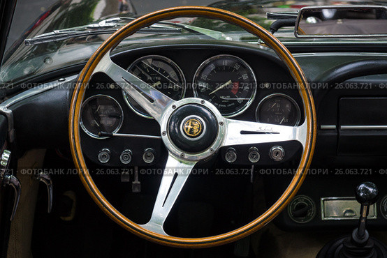 BERLIN - JUNE 14, 2015: Cabin of a luxury car Alfa Romeo 2600 Spider (Tipo 106), 1963. The Classic Days on Kurfuerstendamm. Редакционное фото, фотограф Sergey Kohl / Фотобанк Лори