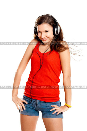 Beutiful girl listen music isolated on white. Стоковое фото, агентство Ingram Publishing / Фотобанк Лори