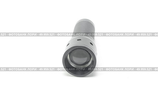 Black flashlight isolated on white background. Стоковое фото, агентство Ingram Publishing / Фотобанк Лори