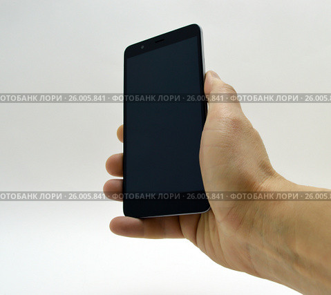 Black smartphone in hand. Стоковое фото, фотограф Дмитрий Родин / Фотобанк Лори