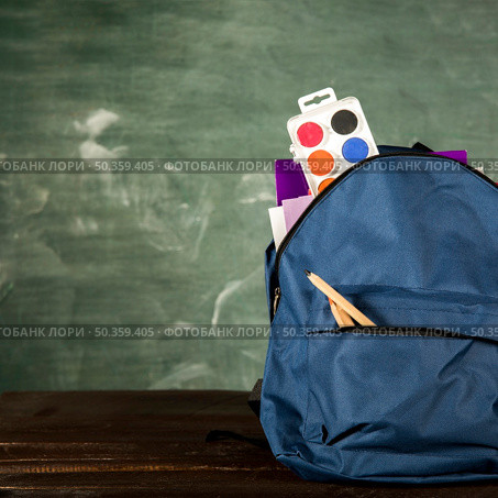 blue backpack with stationery watercolors. Стоковое фото, агентство Ingram Publishing / Фотобанк Лори