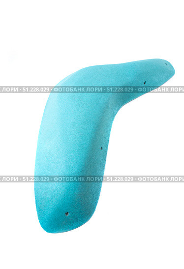 Blue climbing hold on white background, used for indoor and outdoor rock climbing training, fitness, and sport activities in gyms and climbing walls. Стоковое фото, фотограф Татьяна Терехина / Фотобанк Лори